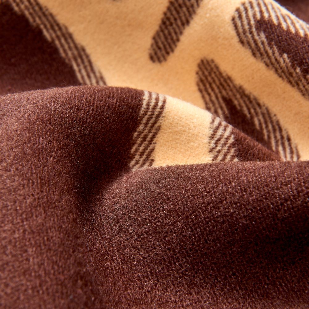 Detailed images of the Anifurry Thunderbird Merino wool blanket showcasing the texture of its faux fur.
